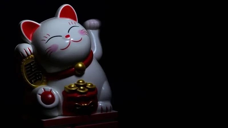 Meme mèo cười nham hiểm tạo ra sự bất ngờ và hài hước với biểu cảm đặc biệt.